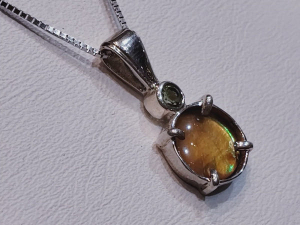 Ammolite Petite Round Silver Pendant Is 8mm With a 3mm Genuine Peridot Gemstone Accent. Pn.E20302