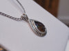 Ammolite Silver Aura Pendant with a 8x12mm Gemstone