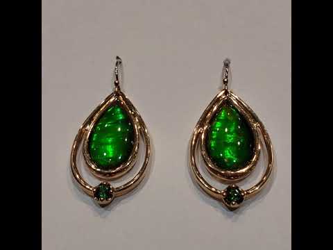 Teardrop Dangle Ammolite Earrings Video with Emerald Accent Gemstones Set in Solid Gold