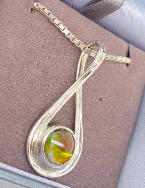 Ammolite Silver Pendant with an Infinity Design Left View PN E10252