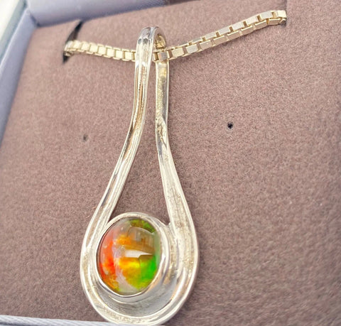 Ammolite Silver Pendant with an Infinity Design PN E10252